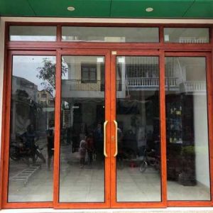 Mẫu cửa nhôm hệ 55 giả gỗ được nhiều khách hàng ưa chuộng