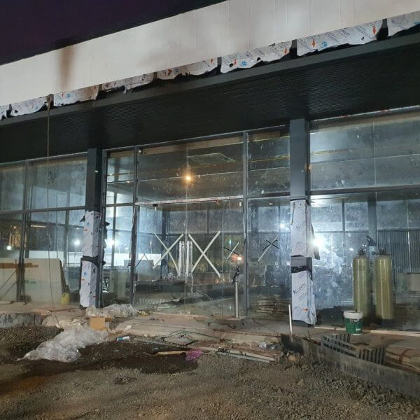 Lắp đặt cửa kính cường lực mở 2 chiều cho KDC Thăng Long Hiệp Phước, Đồng Nai