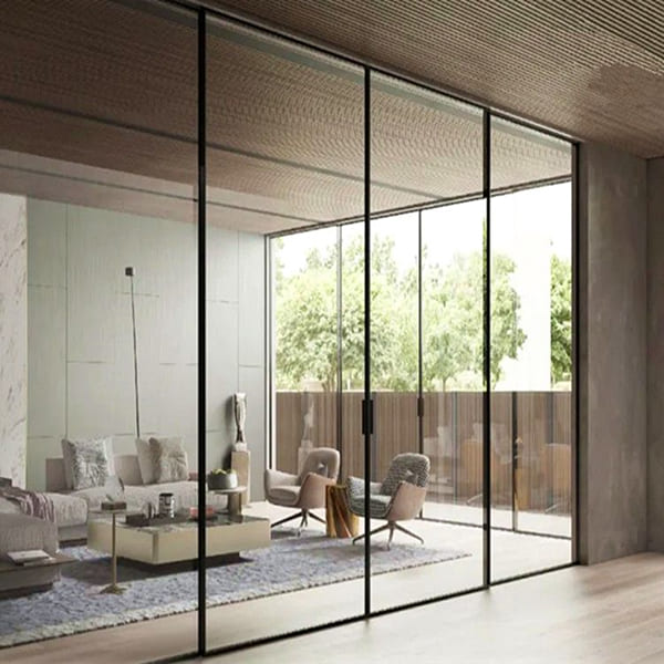 Thiết kế vách ngăn kính cường lực phòng khách viền nhôm đen tạo điểm nhấn hiện đại
